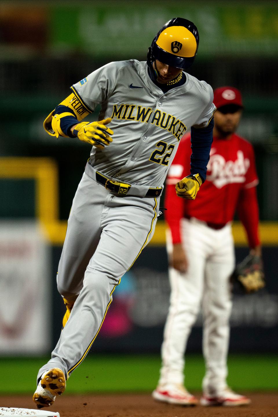 Brewers outfielder Christian Yelich  rounds the bases after hitting a 2-run home run off Reds starter Hunter Greene in the first inning Wednesday night. It was Yelich's second homer of the series and fifth of the season.