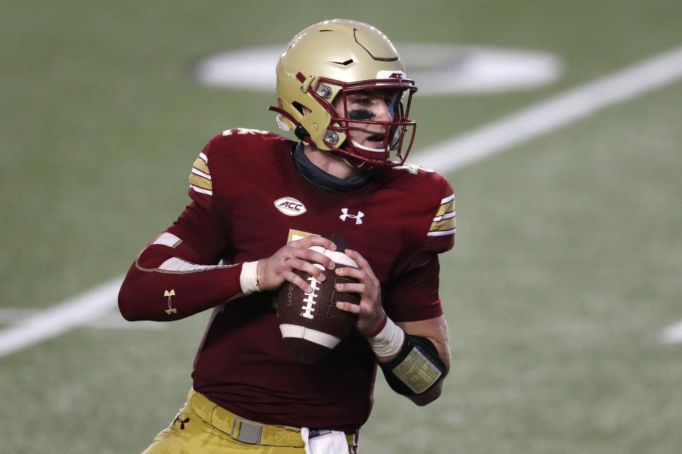 Boston College quarterback Phil Jurkovec drops back to pass during the first half of an NCAA college football game against Georgia Tech, Saturday, Oct. 24, 2020, in Boston. (AP Photo/Michael Dwyer)