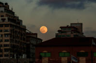 <p>The blood moon was full and visible over Gaza City on May 15. </p>