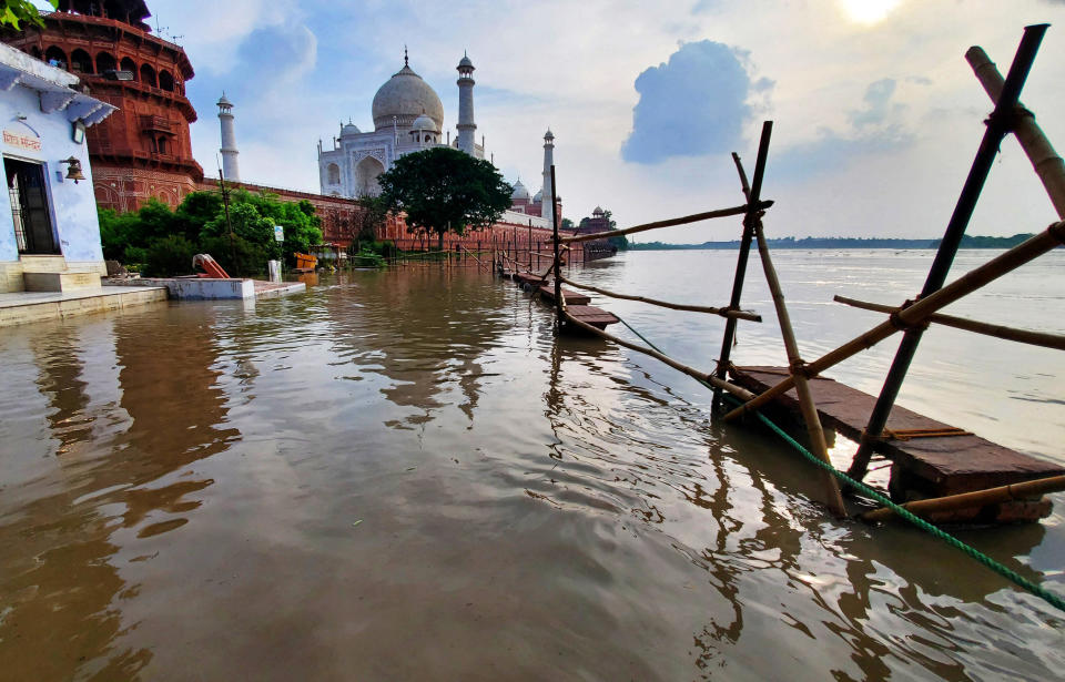 This photograph shows flooded banks of river Yamuna along the Taj Mahal in Agra.  / Credit: PAWAN SHARMA/AFP via Getty Images