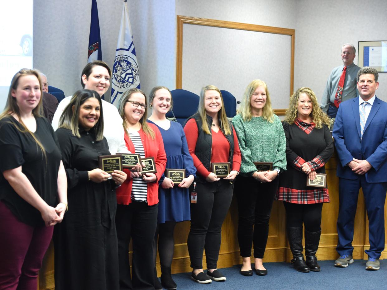 Staunton's teachers of the year were honored Monday night at the school board meeting. From left, Natasha McCurdy, school board chair; Jennifer Torres, Shenandoah Valley Juvenile Center; Liz Keller, Staunton High; Brandy Johnson, Shelburne Middle; Kat McLean, Ware Elementary; Kelsi Weaver, McSwain Elementary; Leigh Branham, Bessie Weller Elementary; Melissa Allen, Dixon Center; and Superintendent Garett Smith.