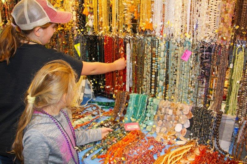 Attendees browse the selection of beads on display at last year's Mississippi Gem and Mineral Society annual show.