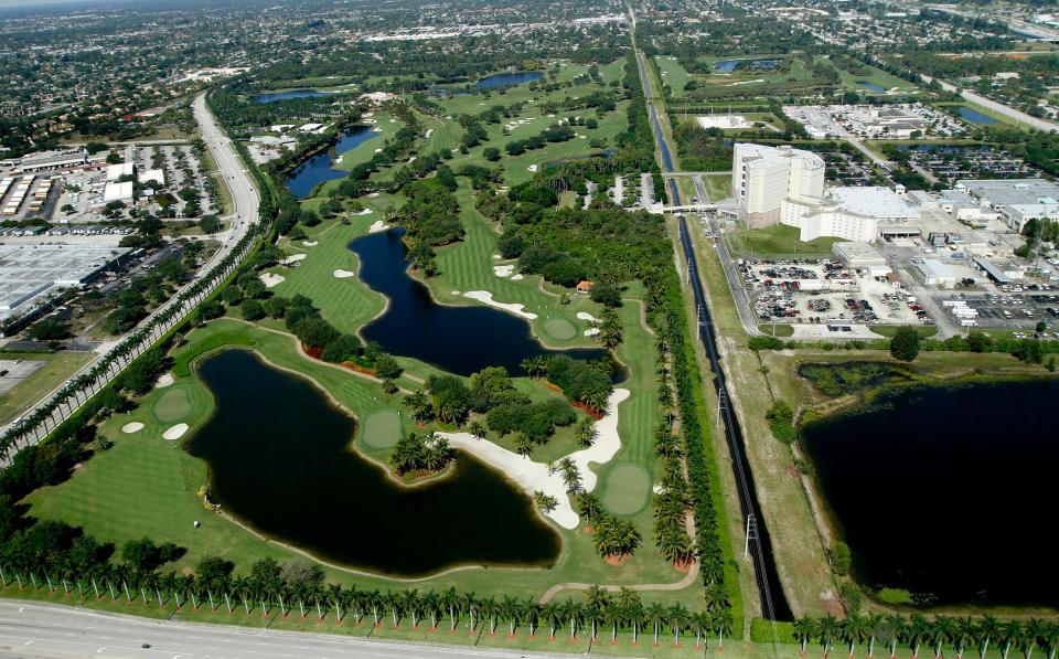 Aerial views of Trump International Golf and Country Club, (L), and Palm Beach County jail, (R), Wednesday, over West Palm Beach on April 25, 2012.