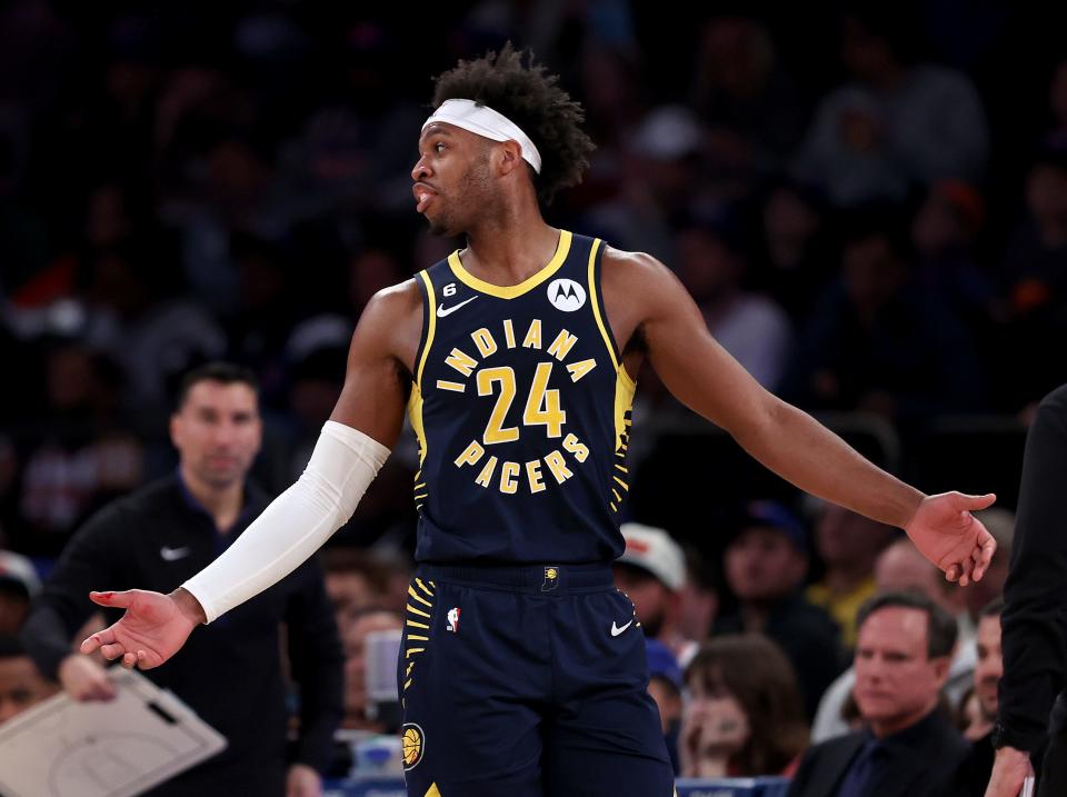 NEW YORK, NEW YORK - APRIL 09:  Buddy Hield #24 of the Indiana Pacers heads to the bench after he cut his hand in the first half against the New York Knicks at Madison Square Garden on April 09, 2023 in New York City.