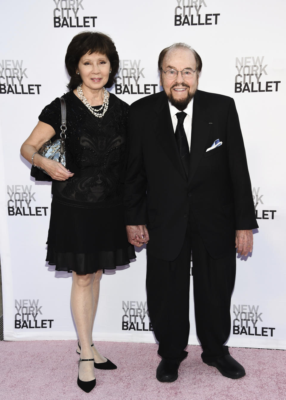 FILE - This Sept. 28, 2017 file photo shows James Lipton, right, and his wife Kedakai at the New York City Ballet's Fall Fashion Gala in New York. Lipton died Monday, March 2, 2020, of bladder cancer at his New York home, his wife told the New York Times and the Hollywood Reporter. He was 93. (Photo by Evan Agostini/Invision/AP, File)