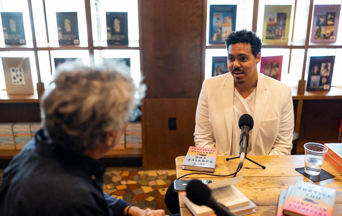 Jonathan Escoffery talks to Books & Books owner and Miami Book Fair co-founder Mitchell Kaplan during a recording of Kaplan’s podcast “The Literary Life” at the bookstore in September.