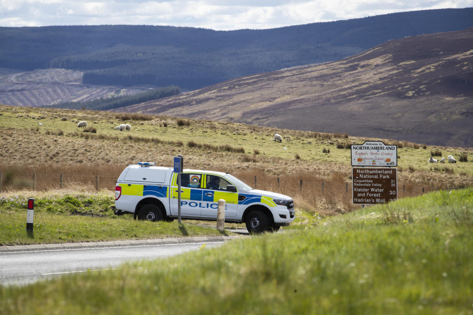 Police patrol the Scotland-England border on the A68 near Jedburgh in the Scottish Borders as the UK continues in lockdown to help curb the spread of the coronavirus.