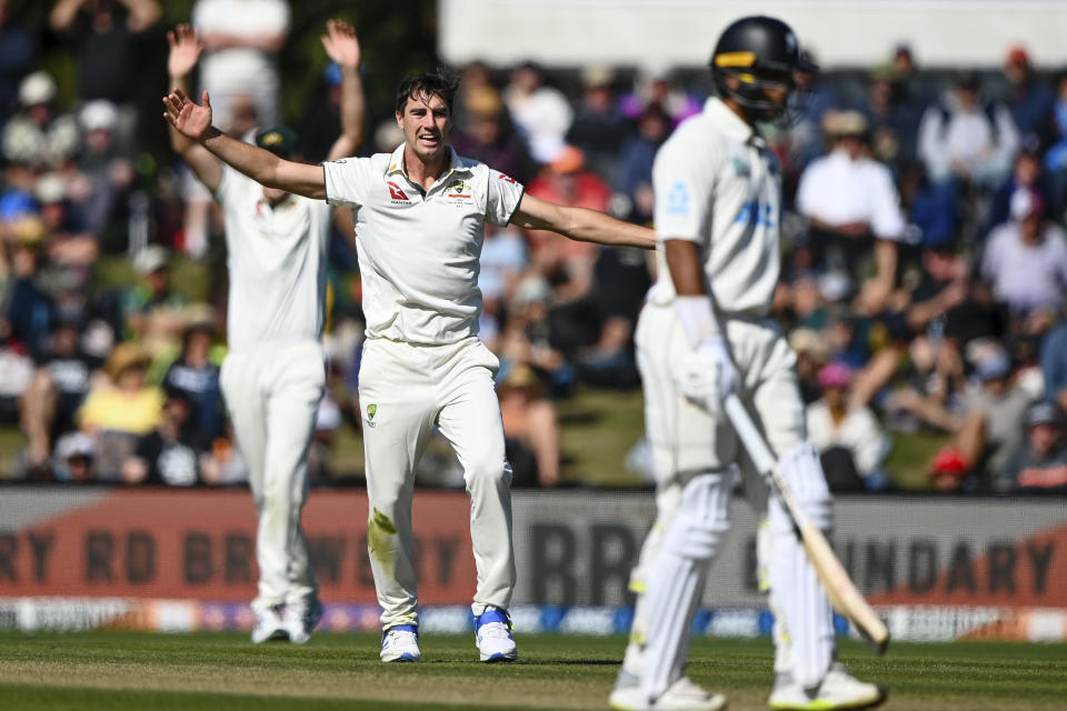 Pat Cummins of Austraila reacts after taking the wicket of New Zealand' Tom Latham on day three of the second cricket test between New Zealand and Australia in Christchurch, New Zealand, Sunday, March 10, 2024. (John Davidson/Photosport via AP)