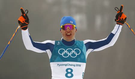 Cross-Country Skiing - Pyeongchang 2018 Winter Olympics - Men's 50km Mass Start Classic - Alpensia Cross-Country Skiing Centre - Pyeongchang, South Korea - February 24, 2018 - Gold medallist Iivo Niskanen of Finland reacts. REUTERS/Kai Pfaffenbach