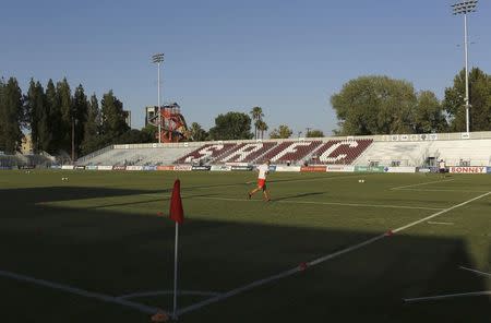 A player runs on Bonney Field, the home of Sacramento Republic FC soccer club, in Sacramento, California August 27, 2014. REUTERS/Robert Galbraith