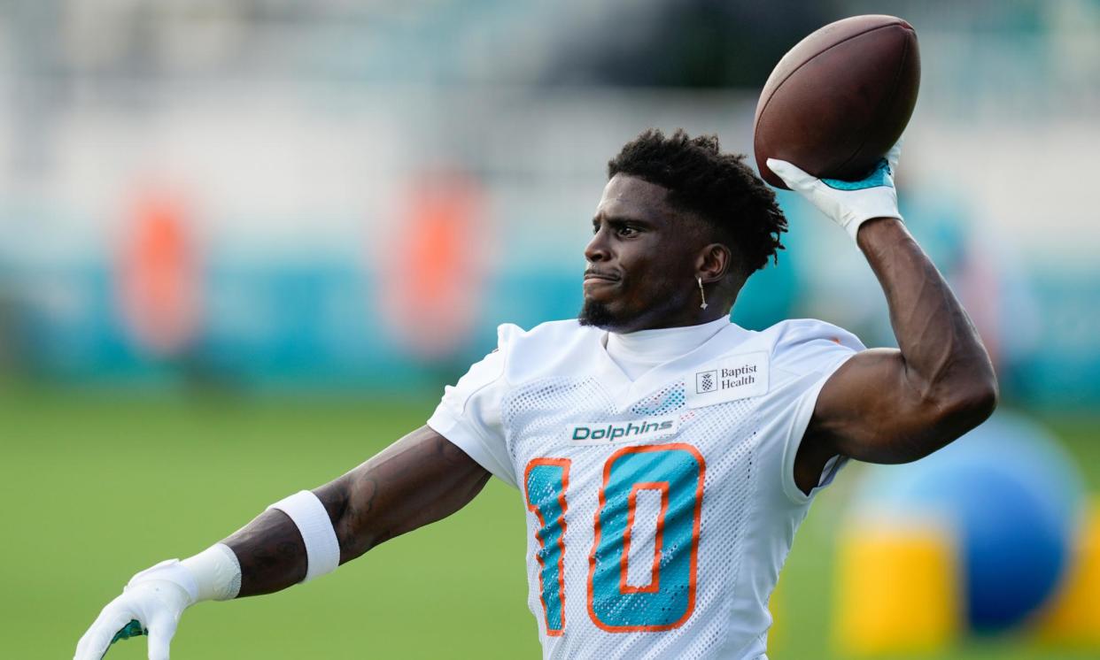 <span>Miami Dolphins wide receiver Tyreek Hill in Miami Gardens, Florida, on Wednesday.</span><span>Photograph: Rebecca Blackwell/AP</span>