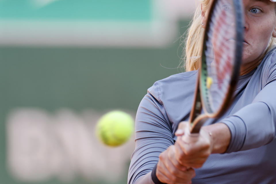 Peyton Stearns of the U.S. eyes the ball as she plays a shot against Russia's Daria Kasatkina during their third round match of the French Open tennis tournament at the Roland Garros stadium in Paris, Friday, June 2, 2023. (AP Photo/Jean-Francois Badias)