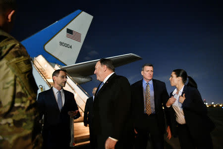 U.S. Secretary of State Mike Pompeo chats with Charge D'affaires at the US Embassy in Baghdad Joey Hood upon arrival in Baghdad, Iraq May 7, 2019. Mandel Ngan/Pool via REUTERS