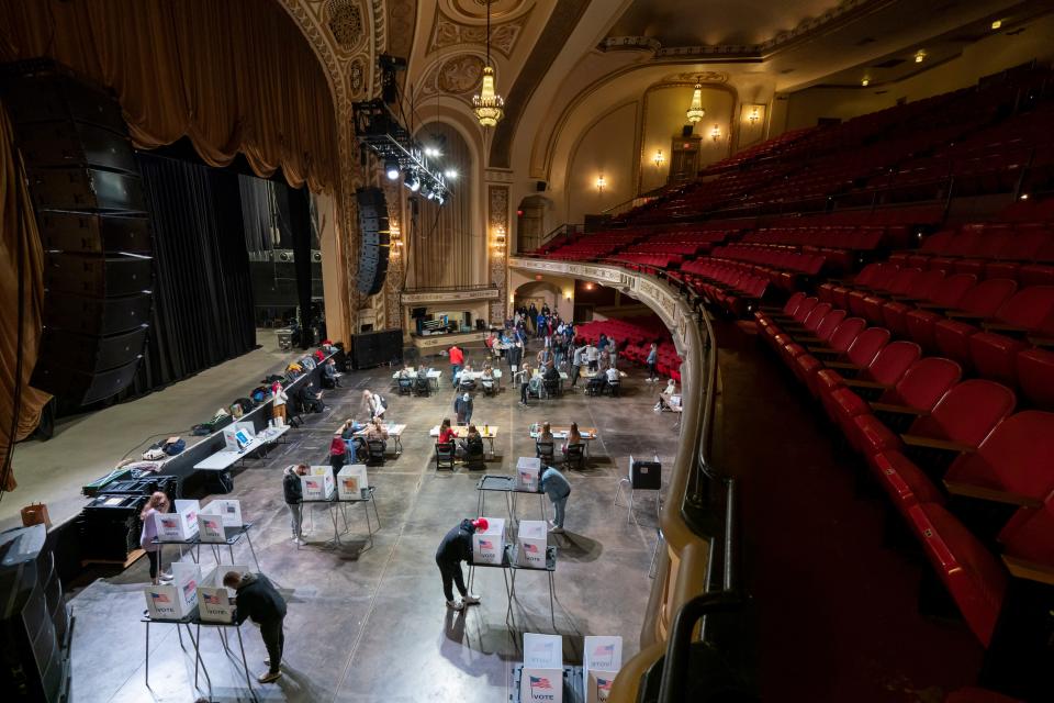 Voters cast their ballots at The Orpheum Theater in Madison, Wisconsin, which opened its doors for the first time since the pandemic began, November 3, 2020.