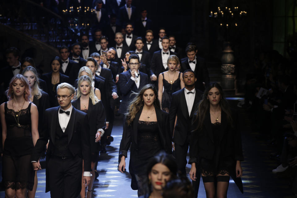 Models wear creations for Dolce & Gabbana men's Fall-Winter 2017-2018 collection, part of the Milan Fashion Week, unveiled in Milan, Italy, Saturday, Jan. 14, 2017. (AP Photo/Luca Bruno)