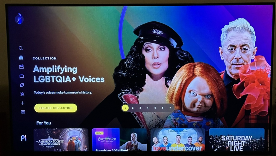 Cher, Chucky, and Alan Cumming pictured on a streaming platform's "Amplifying LGBTQIA+ Voices" collection page