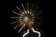 A model wears a design from the Philip Treacy Spring/Summer 2013 collection during London Fashion Week, Sunday, Sept. 16, 2012. (AP Photo/Jonathan Short)