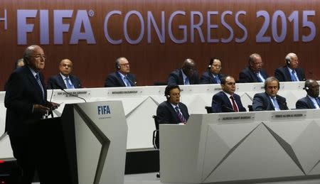 FIFA President Sepp Blatter (L) delivers an opening speech at the 65th FIFA Congress in Zurich, Switzerland, May 29, 2015. REUTERS/Arnd Wiegmann