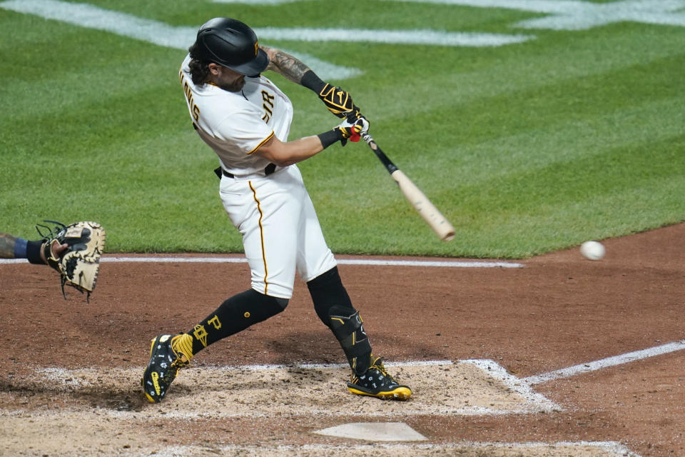 Pittsburgh Pirates' Michael Chavis drives in Oneil Cruz with a pinch-hit double in the sixth inning of a baseball game against the Milwaukee Brewers, Wednesday, Aug. 3, 2022, in Pittsburgh. (AP Photo/Keith Srakocic)