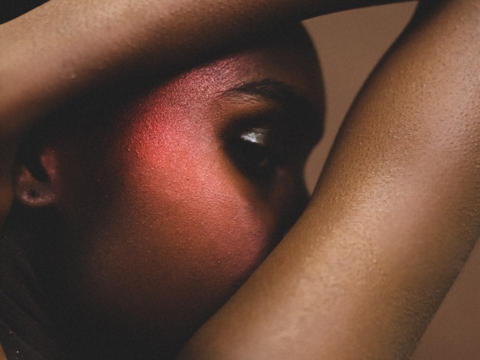 Close up image of model wearing red highlighter
