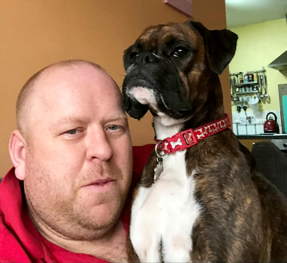 Owner Gary Hirtsch, pictured with Bella. Mr Hirstch said he was glad to see justice done after his dog walker was caught on camera beating his pet in his own home. (SWNS)