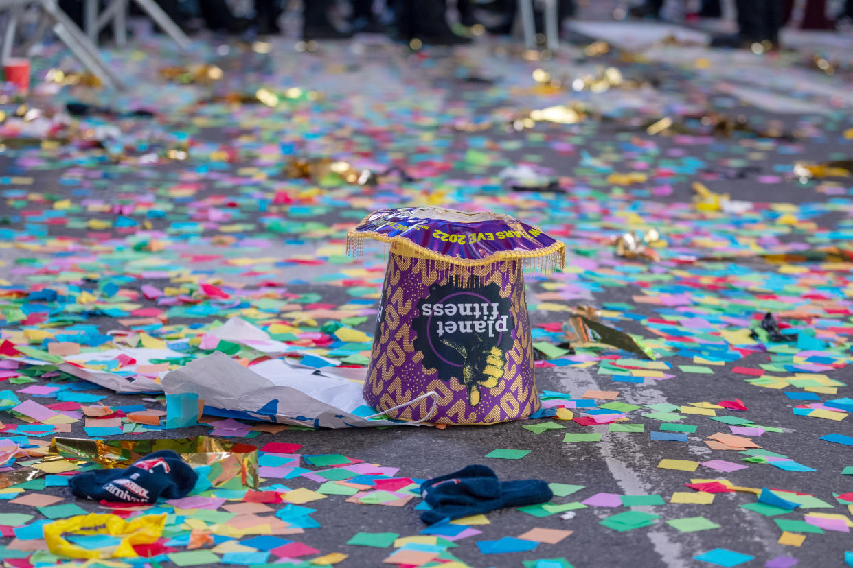 NEW YORK, NEW YORK - JANUARY 01: Trash and confetti is left on the street after New Year’s Eve in Times Square on January 01, 2022 in New York City. Despite a surge in COVID-19 cases New Year’s Eve happened as planed but with only 15,000 vaccinated participants allowed, who were also required to be masked at all times. In an effort to increase safety, people were initially only allowed in beginning at 3 p.m. on the day of, but were let in earlier. People will also be spread out in socially-distanced pens. Last year’s celebration allowed no spectators due to the coronavirus pandemic. (Photo by Alexi Rosenfeld/ Getty Images)
