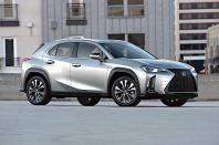 <p>The production UX first appeared at the 2018 Geneva Show, and it was immediately clear that the styling of the concept, while still quite angular, had been watered down considerably. The typically extravagant <strong>Lexus front grille</strong> was carried over, so there was no doubt about whose work the car was, but on the whole it really just looked the way you would expect a small Lexus SUV to look. The doors, unlike those of the concept, were conventional.</p><p><strong><em>By Ronan Glon and David Finlay</em></strong></p>