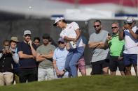 Min Woo Lee of Australia plays a shot on 10th hole during the final round of Abu Dhabi HSBC Golf Championship, in Abu Dhabi, United Arab Emirates, Sunday, Jan. 22, 2023. (AP Photo/Kamran Jebreili)