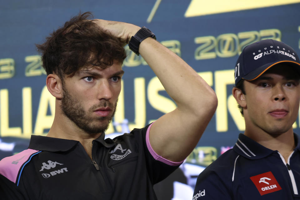 Alpine driver Pierre Gasly of France, left, and AlphaTauri driver Nick de Vries of Netherlands attend a press conference ahead of the Australian Formula One Grand Prix at Albert Park in Melbourne, Thursday, March 30, 2023. (AP Photo/Asanka Brendon Ratnayake)