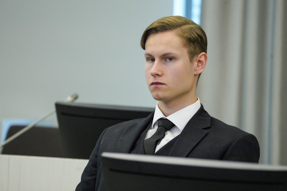 Defendant Philip Manshaus sits in a court room in Asker and Baerum district court in Sandvika, Norway, as he waits for the verdict on the last day of his trial, Thursday, Jun 11, 2020. The Norwegian man is charged with murder and terrorism in the killing of his stepsister and the storming of an Oslo mosque, and, according to a Norwegian prosecutor, should get the maximum 21 years in prison. (Håkon Mosvold Larsen/NTB Scanpix via AP, POOL)
