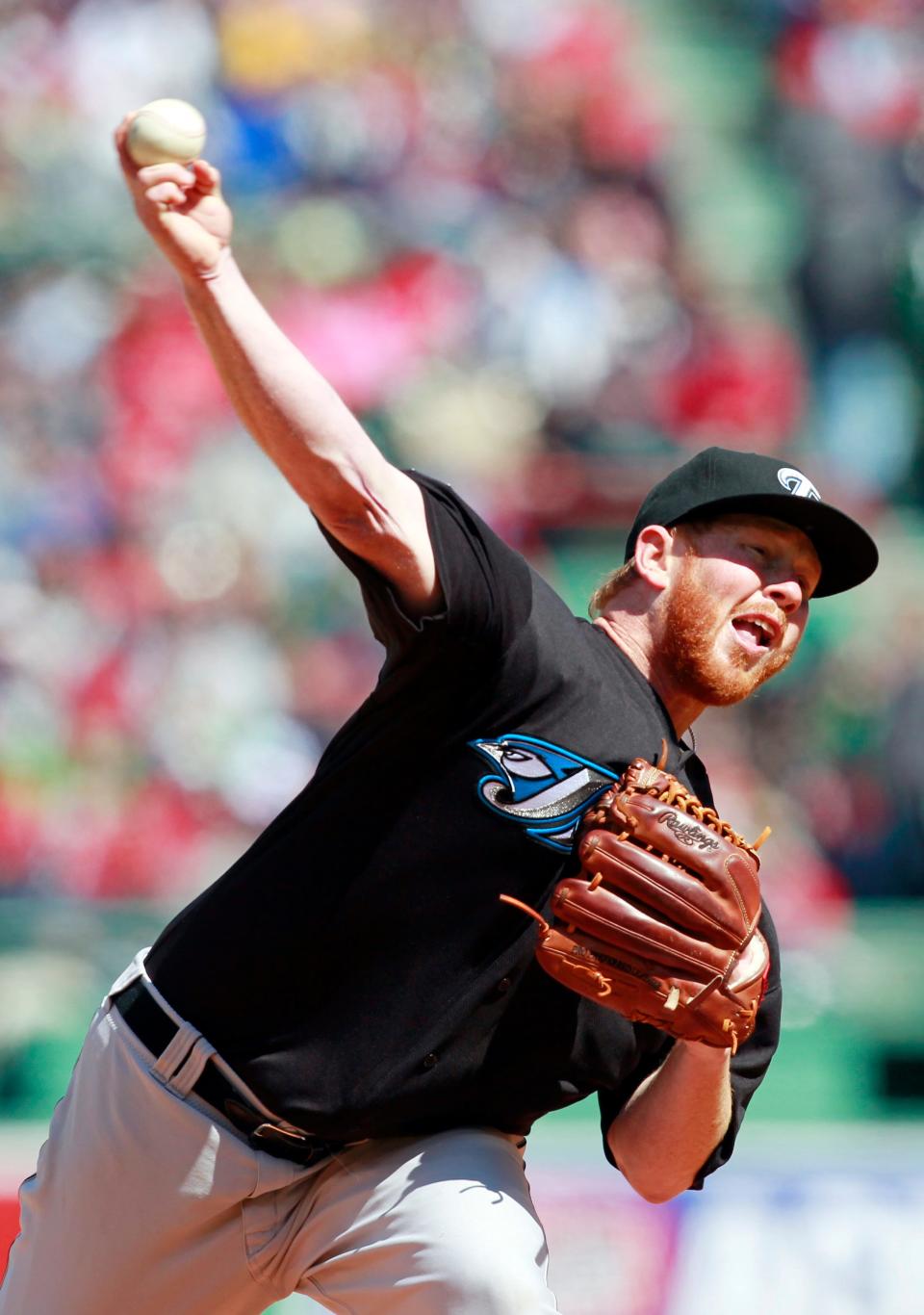 The Blue Jays' Jesse Litsch pitches in the first inning of the Red Sox' 8-1 victory on Sunday at Fenway Park.