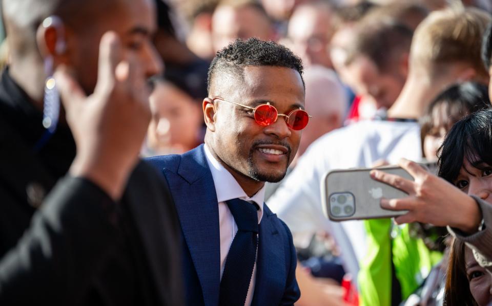 Patrice Evra takes selfies with United fans