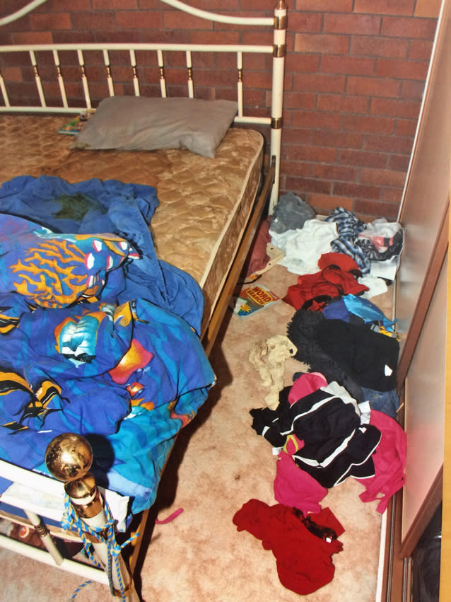 Punched her in the belly': Pictures from inside room where girl died