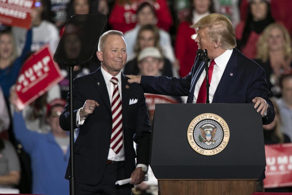 Rep. Jeff Van Drew stands next to President Donald Trump at a Keep America Great campaign rally in Wildwood, NJ on Tuesday, Jan. 28, 2020. Van Drew switched over to the Republican Party. (Heather Khalifa /The Philadelphia Inquirer via AP)