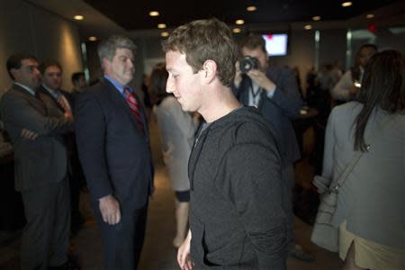 Facebook CEO Mark Zuckerberg leaves the stage after an onstage interview for the Atlantic Magazine in Washington, September 18, 2013. REUTERS/Jonathan Ernst