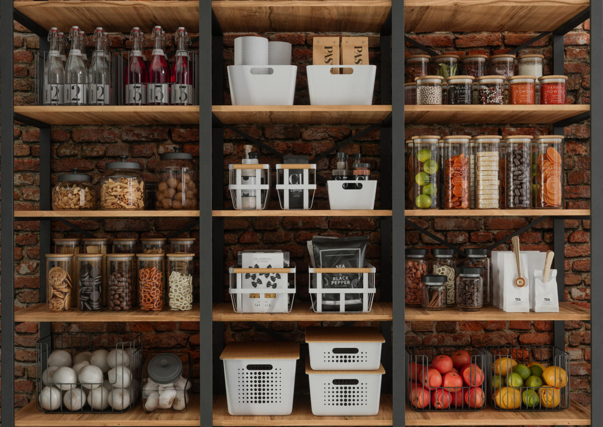  An organized open kitchen cabinet. 