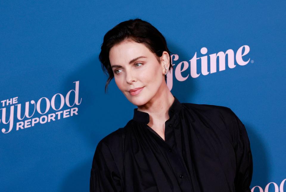 Charlize Theron accepted the Sherry Lansing Leadership Award at The Hollywood Reporter's annual Woman in Entertainment event presented by Lifetime on Wednesday in Los Angeles.