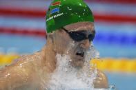 South Africa's Cameron Van der Burgh competes in the men's 100m breaststroke final swimming event at the London 2012 Olympic Games in London. Van der Burgh won gold