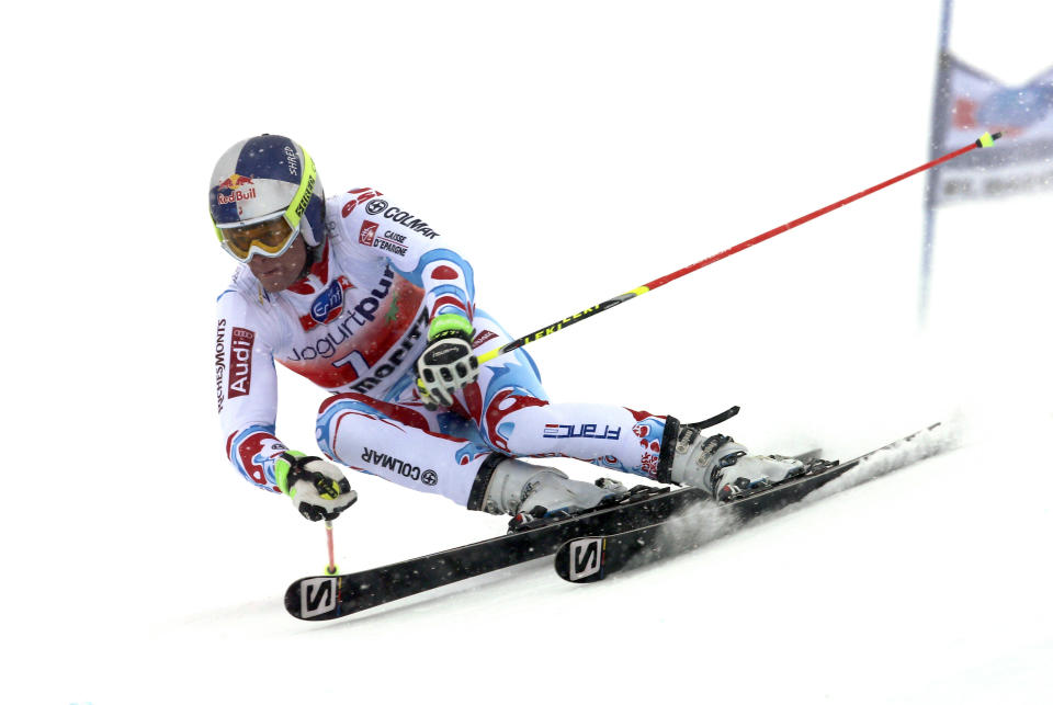 France's Alexis Pinturault speeds down the course during the first run of an alpine ski men's World Cup giant slalom in St. Moritz, , Switzerland, Sunday, Feb. 2, 2014. (AP Photo/Pier Marco Tacca)