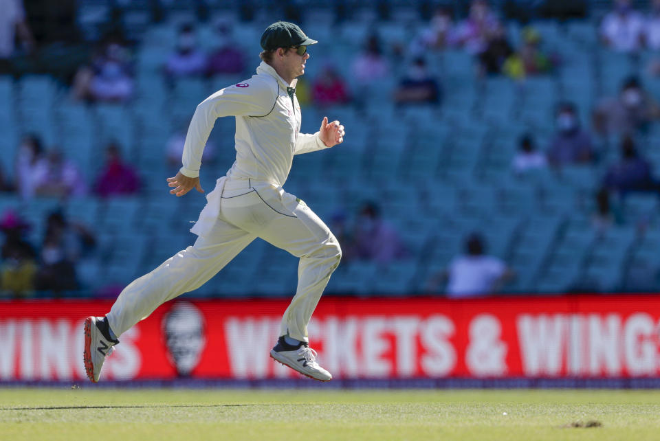 Australia's Steve Smith runs to field the ball during play on the final day of the third cricket test between India and Australia at the Sydney Cricket Ground, Sydney, Australia, Monday, Jan. 11, 2021. (AP Photo/Rick Rycroft)