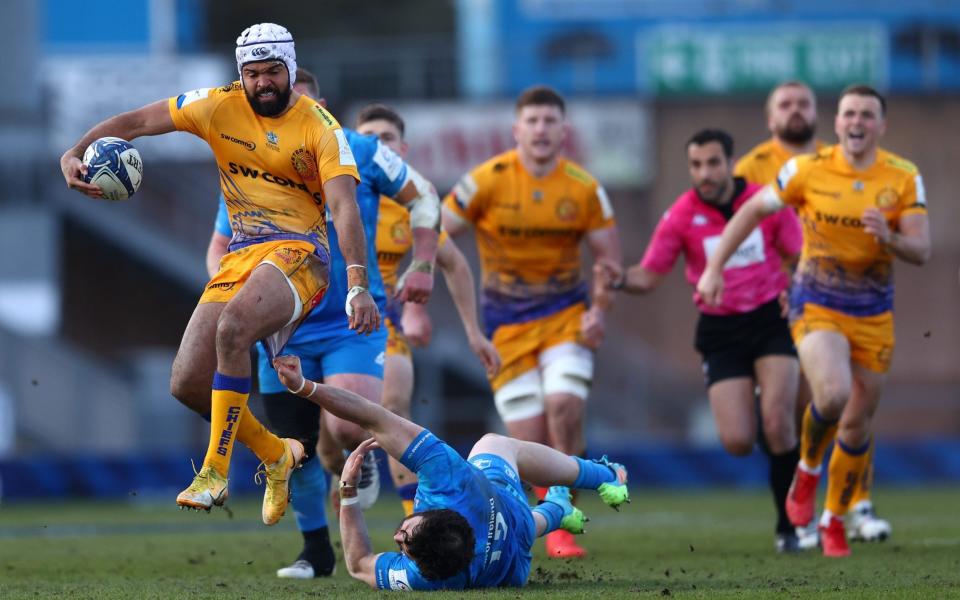Tom O'Flaherty of Exeter Chiefs breaks through a tackle from Robbie Henshaw of Leinster during the Heineken Champions Cup Quarter Final match between Exeter Chiefs and Leinster at Sandy Park on April 10, 2021 in Exeter, England.  - GETTY IMAGES