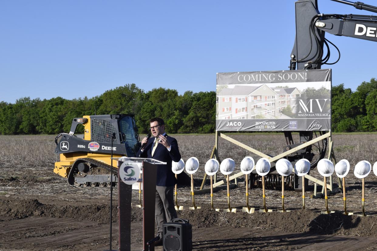 Sen. J.R. Claeys, R-Salina, speaks before the groundbreaking of Phase 1 of Salina Destination Development. This phase of the project will see 254 apartment units built near the Magnolia Road and Interstate 135.