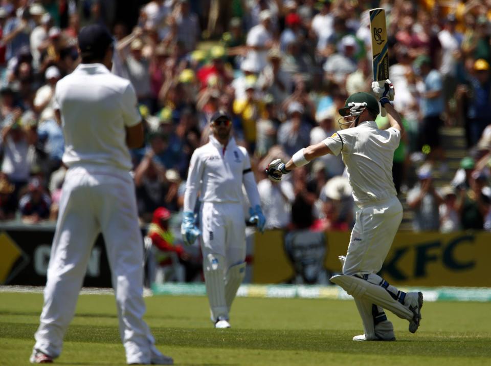 Australia's Brad Haddin (R) celebrates his century during the second day's play in the second Ashes cricket test against England at the Adelaide Oval December 6, 2013.