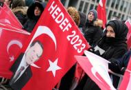 Supporters of Turkish President Recep Tayyip Erdogan gather at Potsdamer Platz during the Libya summit in Berlin