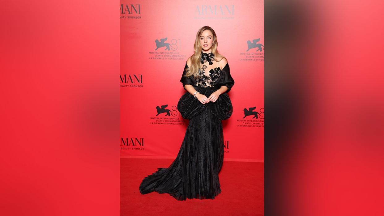 Sweeney wore a black dress with a sheer top while on the red carpet at the Venice Film Festival.