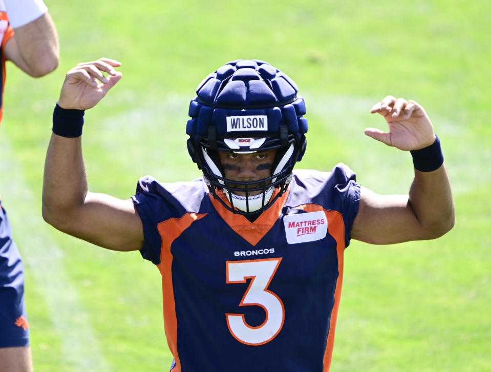 ENGLEWOOD, CO - JULY 29: Denver Broncos quarterback Russell Wilson (3) stretches during the Denver Broncos Back Together Weekend training camp practice at Centura Health Training Center July 29, 2023. (Photo by Andy Cross/MediaNews Group/The Denver Post via Getty Images)