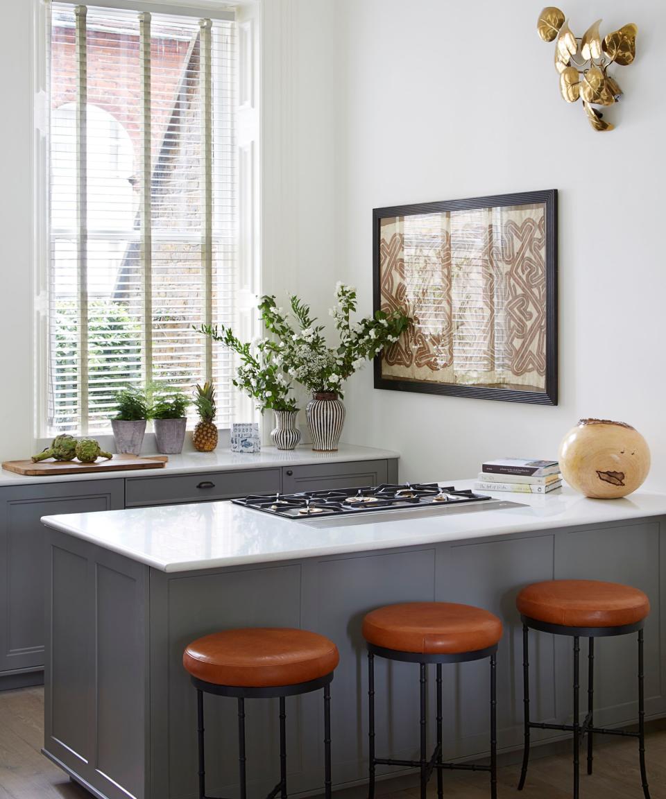 Small narrow Kitesgrove blue kitchen looking towards window