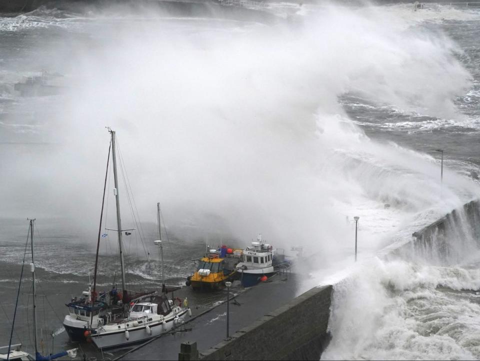 Waves at Stonehaven Harbour as Storm Babet batters the UK for a fourth day (PA)