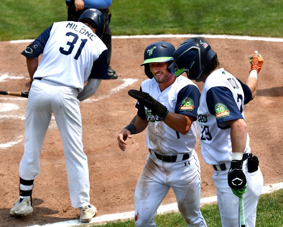 Matty Warren reacts after stealing home Wednesday during the Bravehearts' opener.
