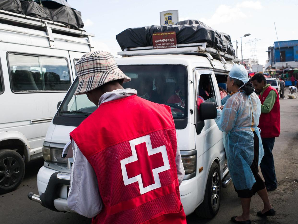 Red Cross workers in Antananarivo, Madagascar, where the plague has spread: AFP/Getty